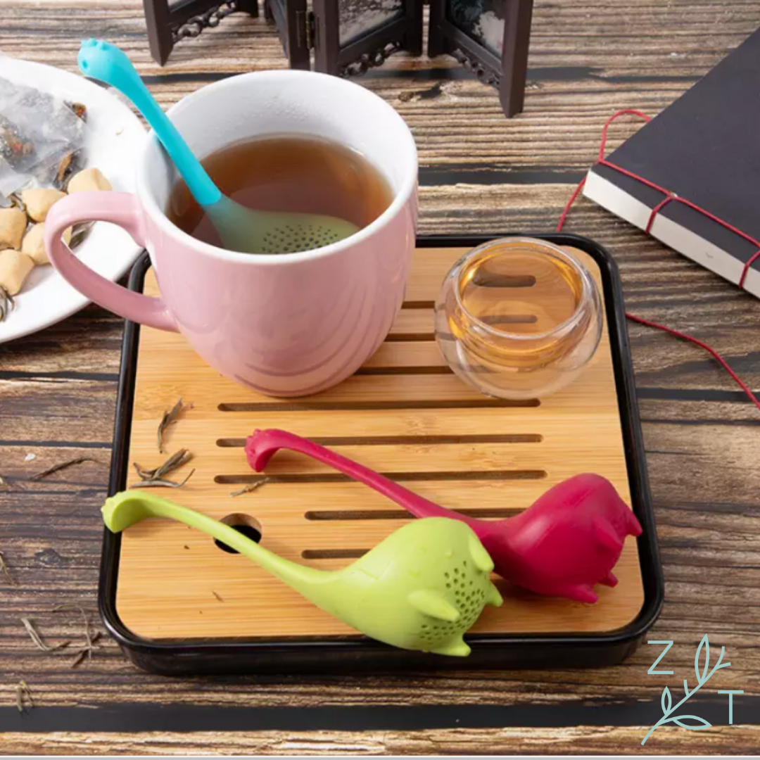 theefilter Thee-ei verse thee infusie dinosaurus monster theesaurus nessie blauw rood groen